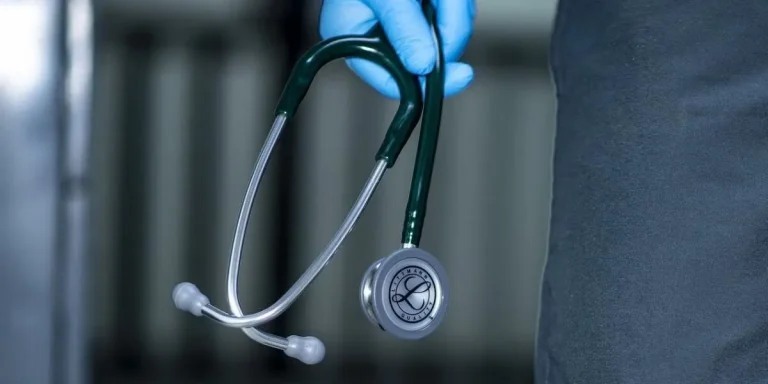 medical student holding a stethoscope